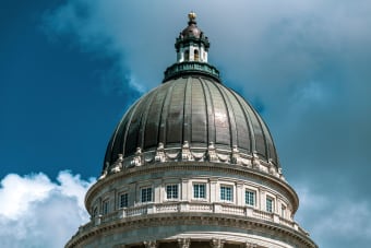 Close-up of the Utah State Capitol dome against a striking sky in Salt Lake City.