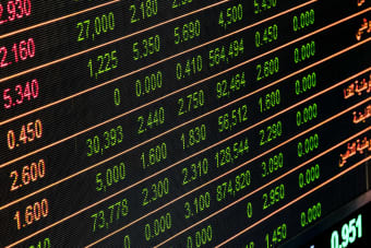 Detailed view of a stock market screen showing numbers and data, symbolizing financial trading.
