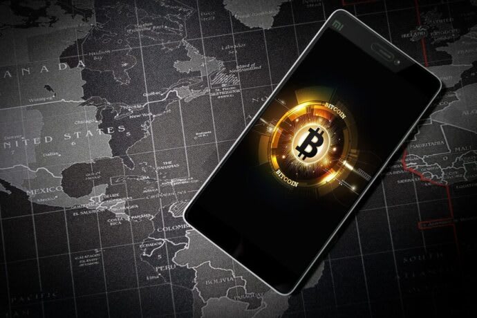 Bitcoin Hits Record $106K, Retreats on Hawkish Fed Rate Cut Fears