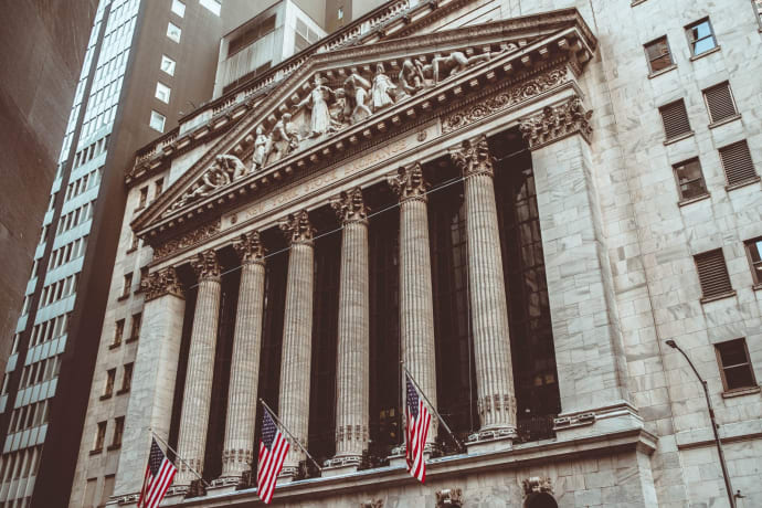 Historic New York Stock Exchange building facade captured in a vintage style.