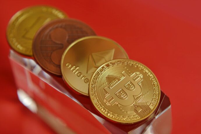 DOGE, XRP Lead Decline as Bitcoin ETFs See $80M Outflow