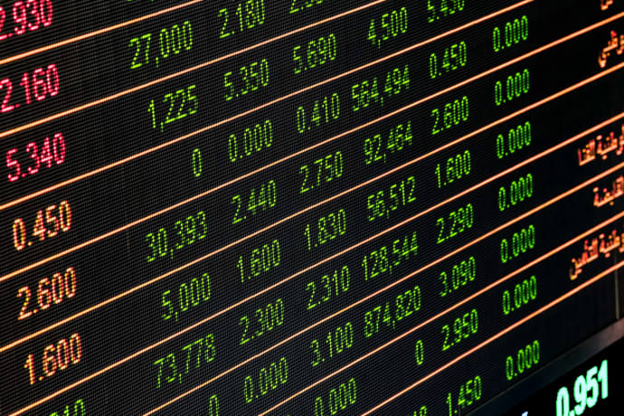 Detailed view of a stock market screen showing numbers and data, symbolizing financial trading.