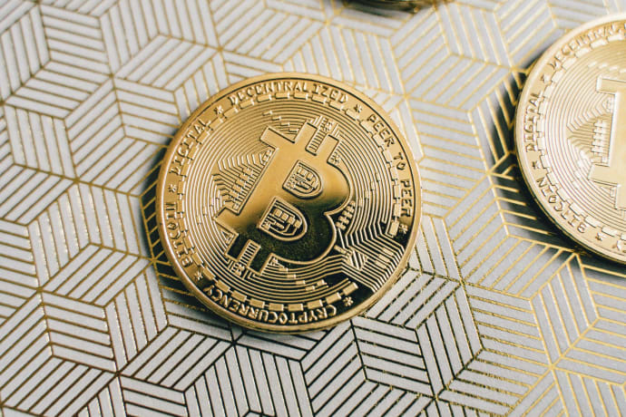 Bitcoin Price Dips After FOMC Rally, But Options Traders Still Bet on $100K