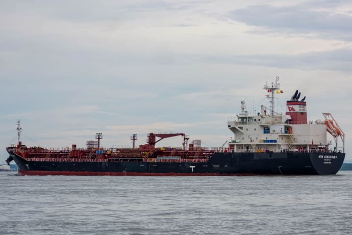 An oil tanker sailing on the open sea, ideal for maritime and logistics concepts.