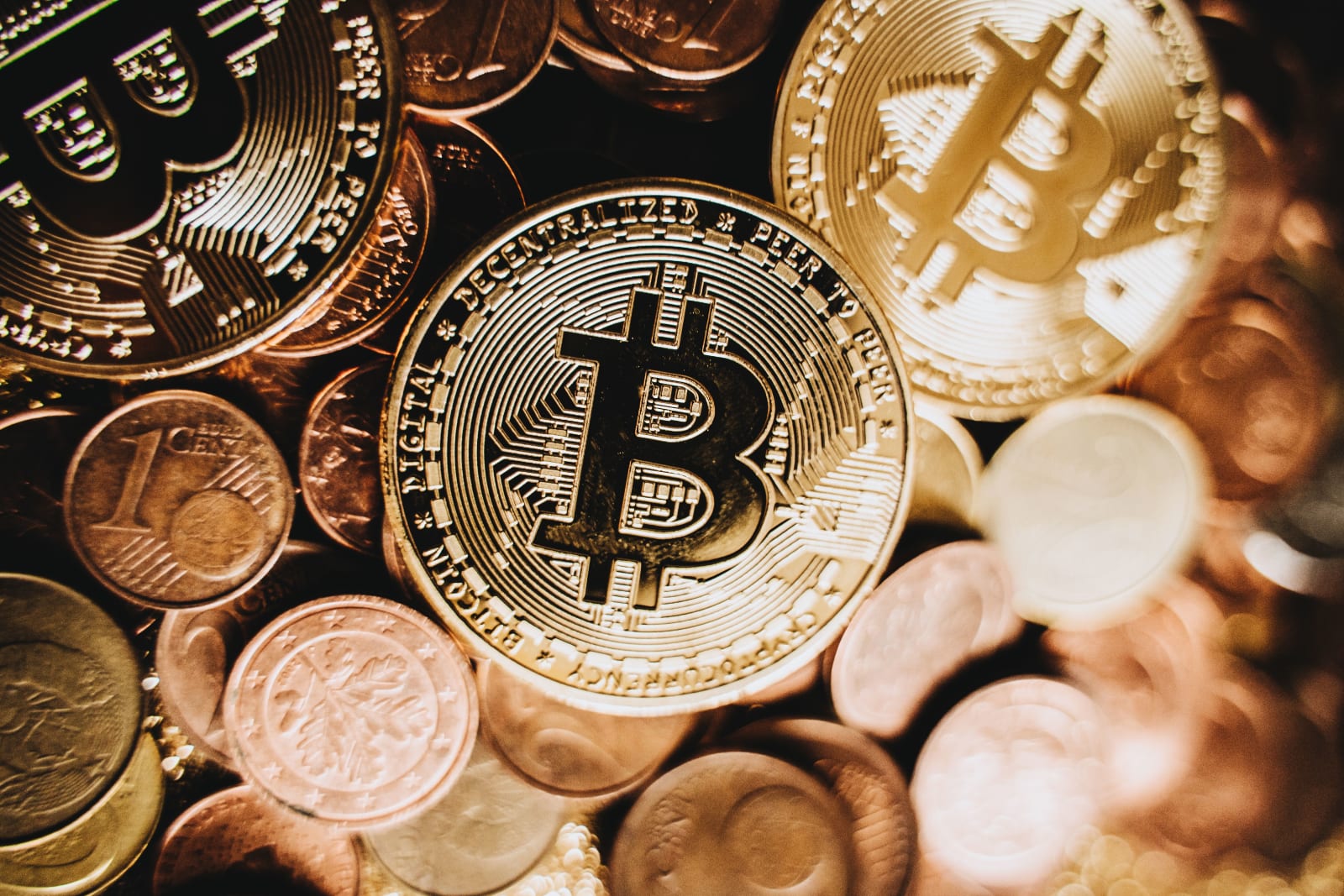 Detailed close-up of bitcoin and euro coins representing cryptocurrency and traditional money in Erfurt.