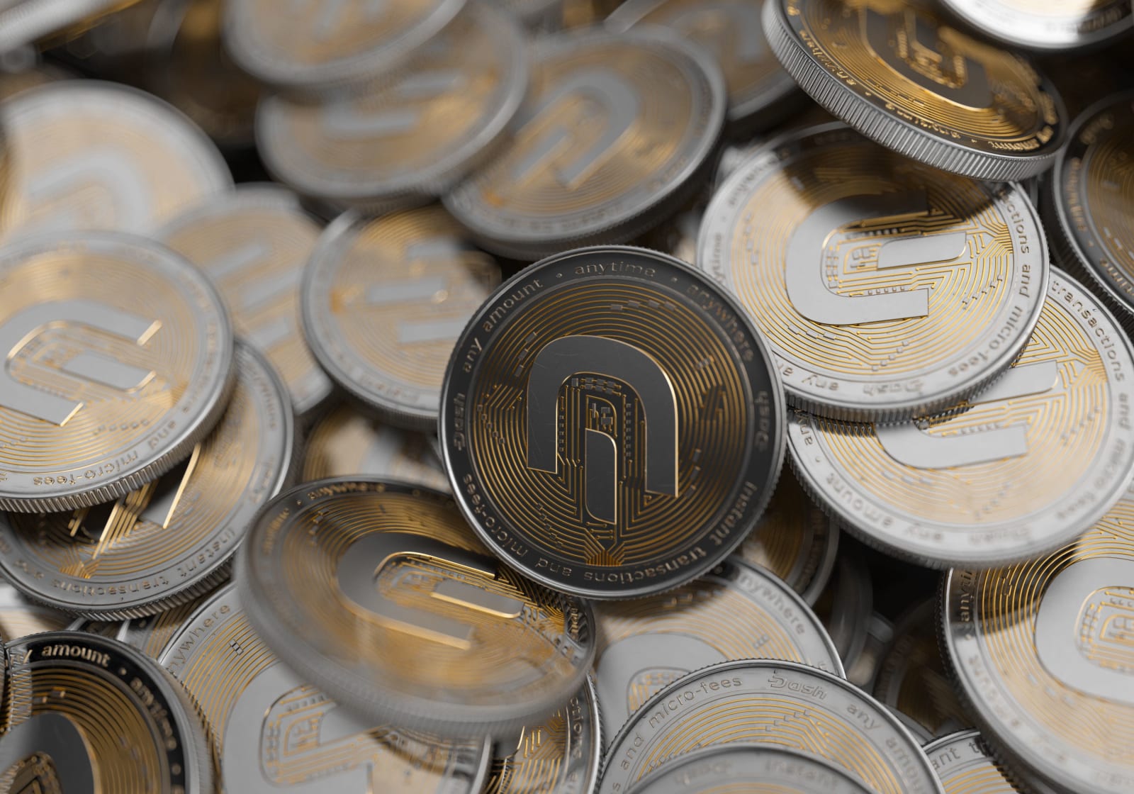 Close-up of multiple gold and silver cryptocurrency coins symbolizing digital currency and finance.