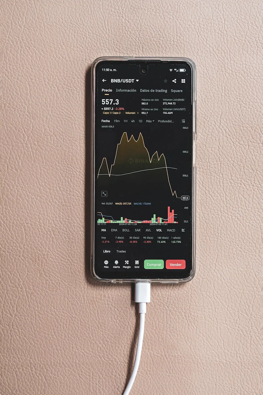 Smartphone showing BNB/USDT trading chart with charging cable plugged in.