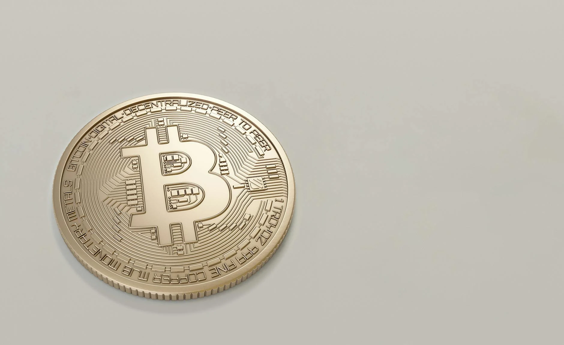 A detailed image of a Bitcoin cryptocurrency coin with a neutral background, symbolizing digital finance and currency.