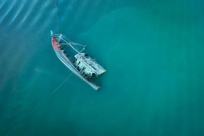 Aerial image of a wrecked ship in turquoise waters near Chukai, Terengganu.