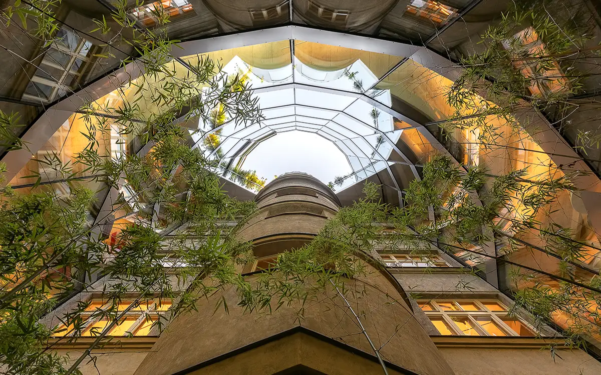 An upward view of the palace atrium captured by architectural photographer Ondrej Hromádko.