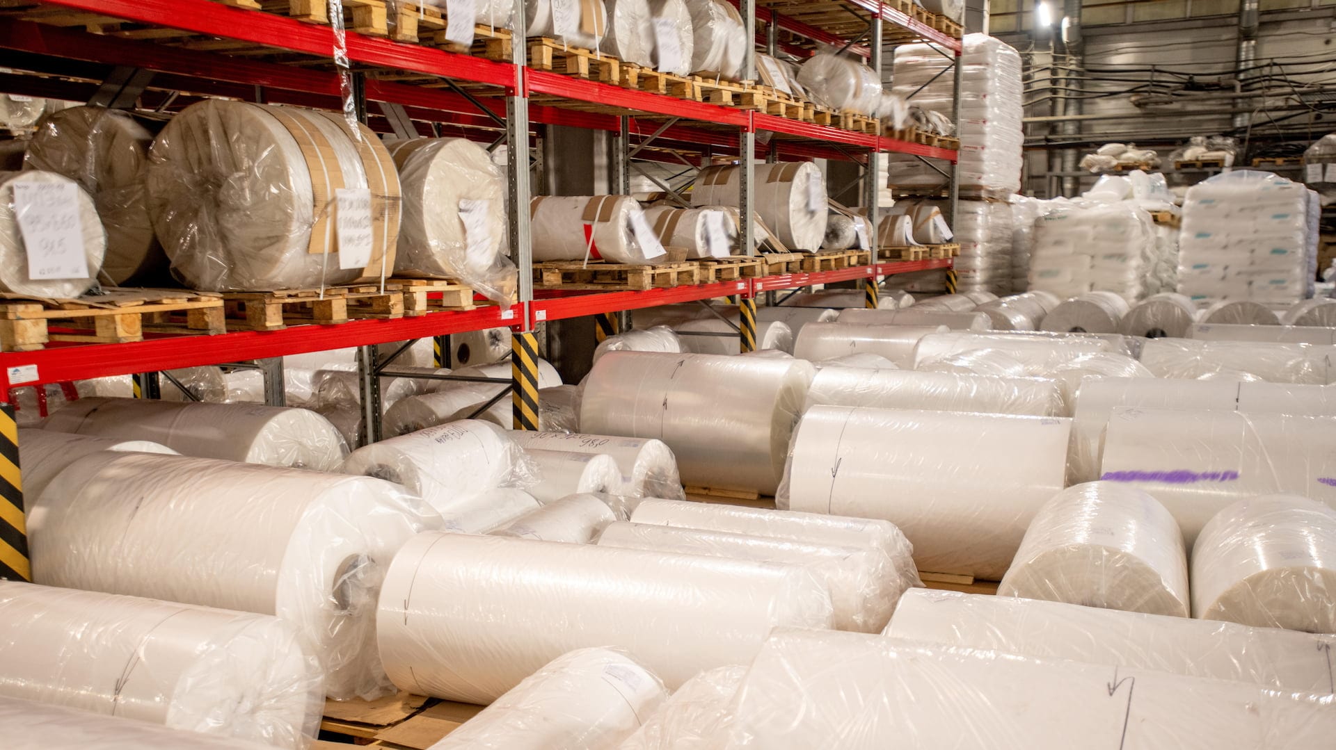 Rolled, packed and wrapped large bobbins of newly produced polyethylene film