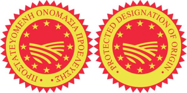 Two red and gold Protected Designation of Origin seals next to each other, one in Greek and the other in English
