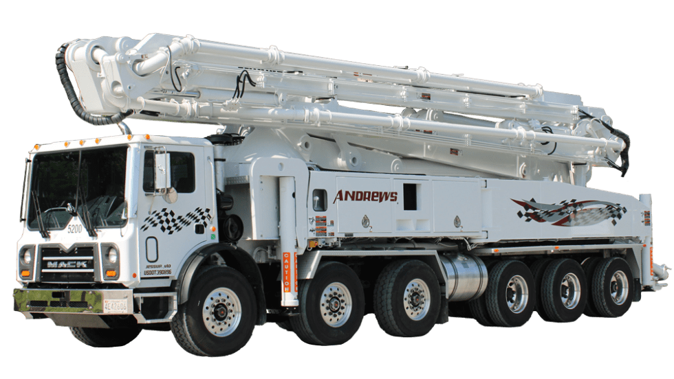 White Mack boom pump truck with an extended concrete boom in West Virginia.