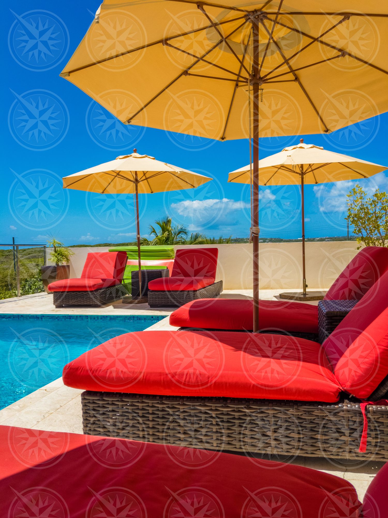 Lounge chairs around pool