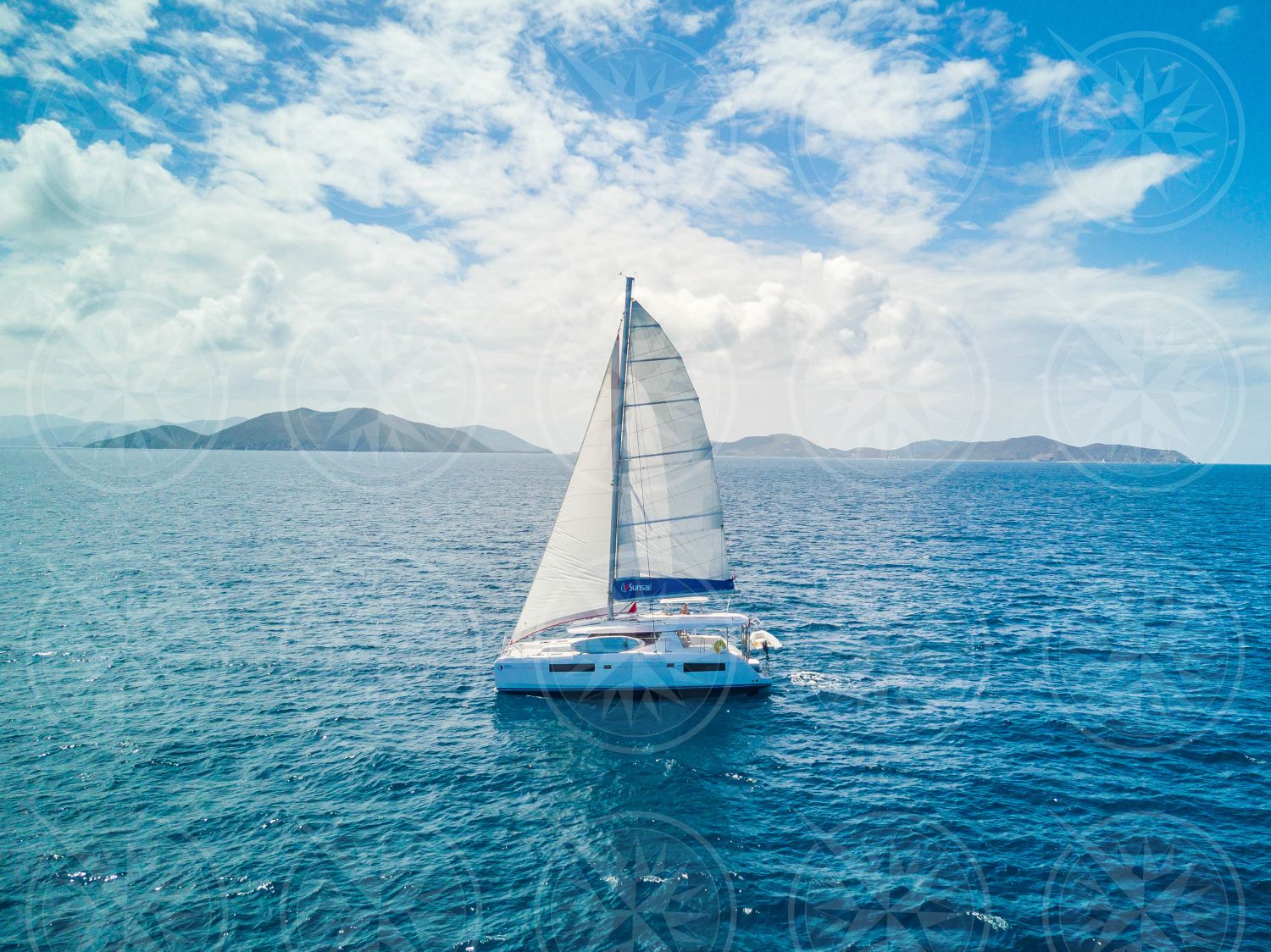 Yacht sailing on open sea.