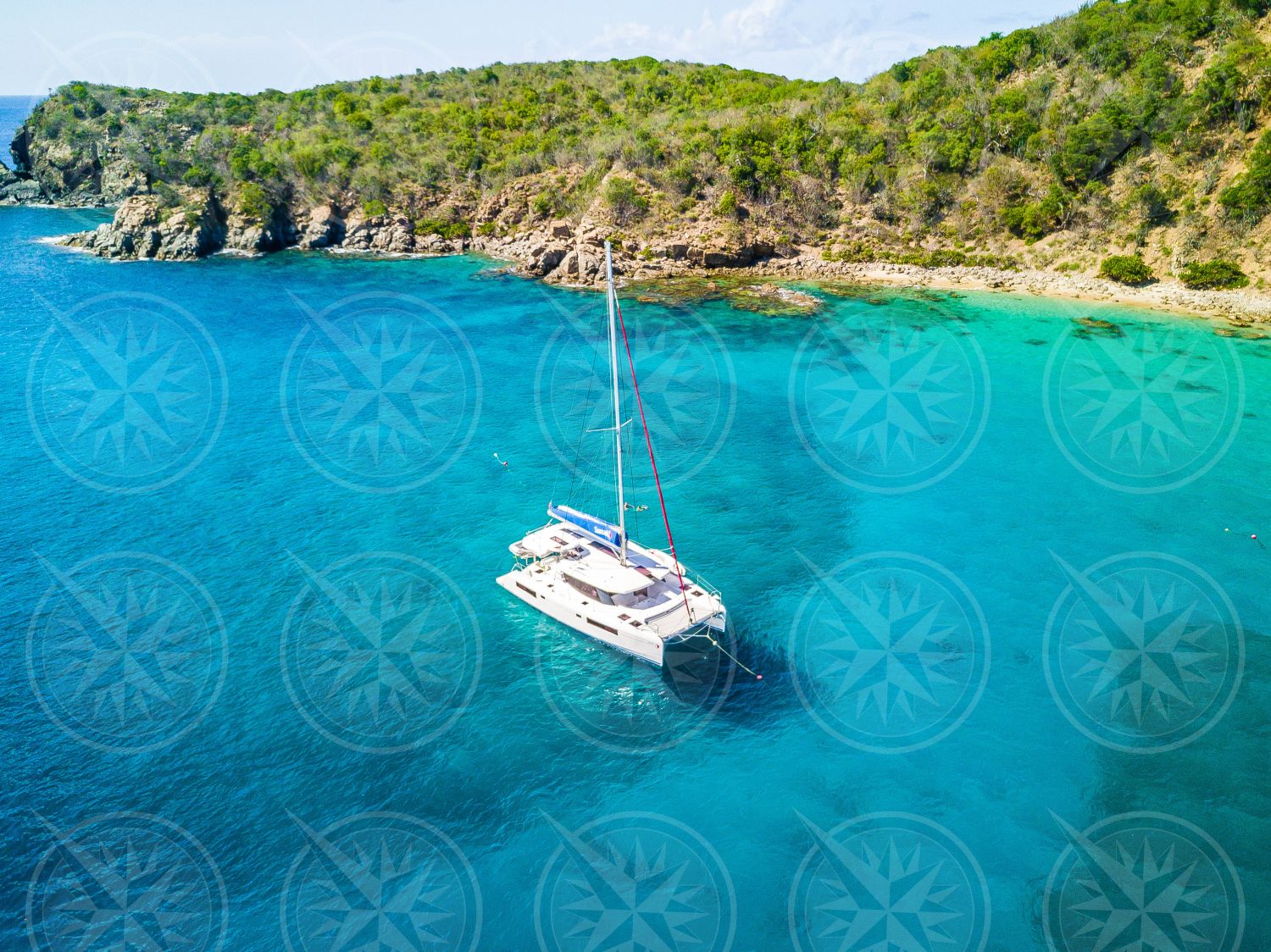 Yacht at anchor from above