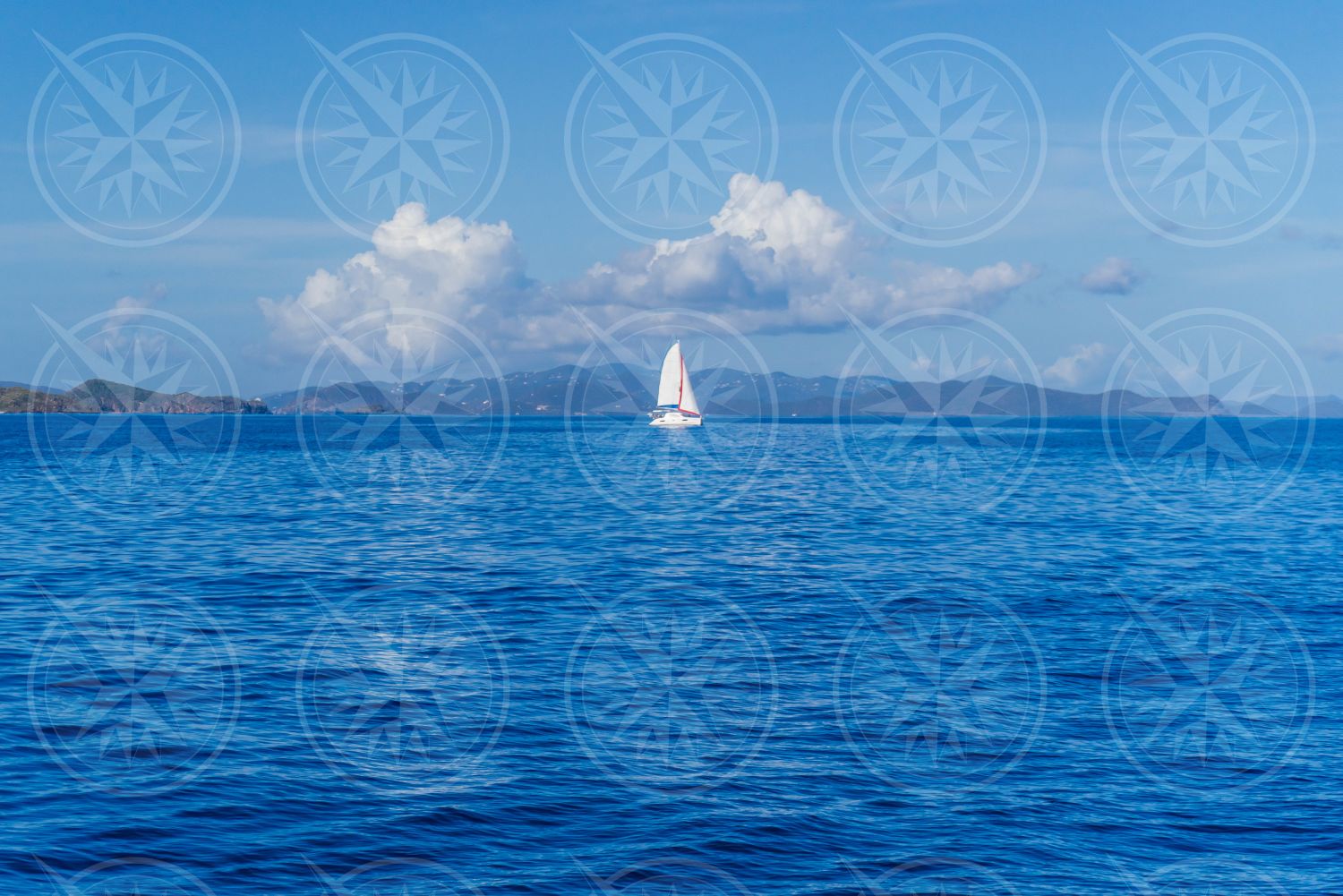 Boat sailing near the horizon