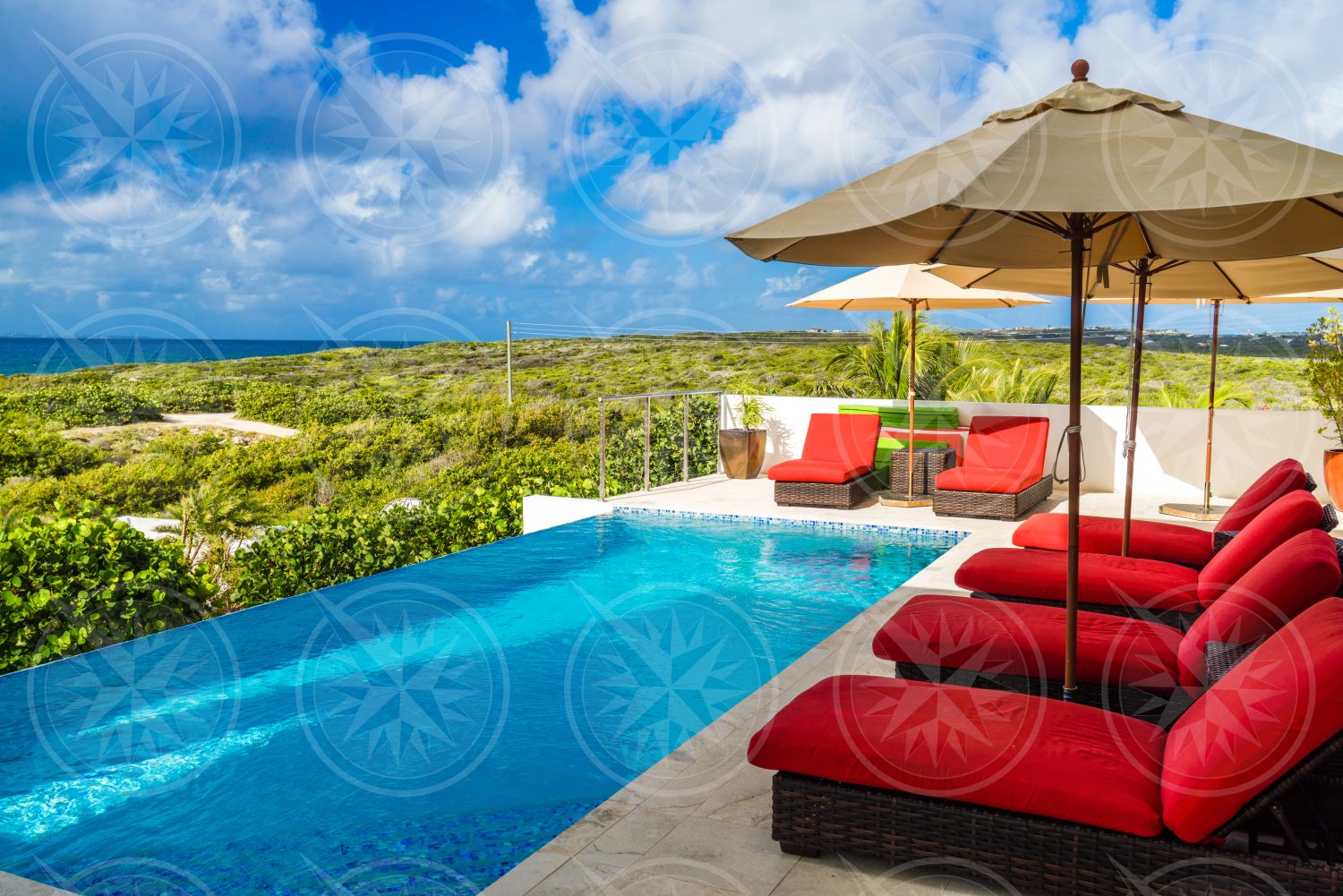 Lounge chairs around pool