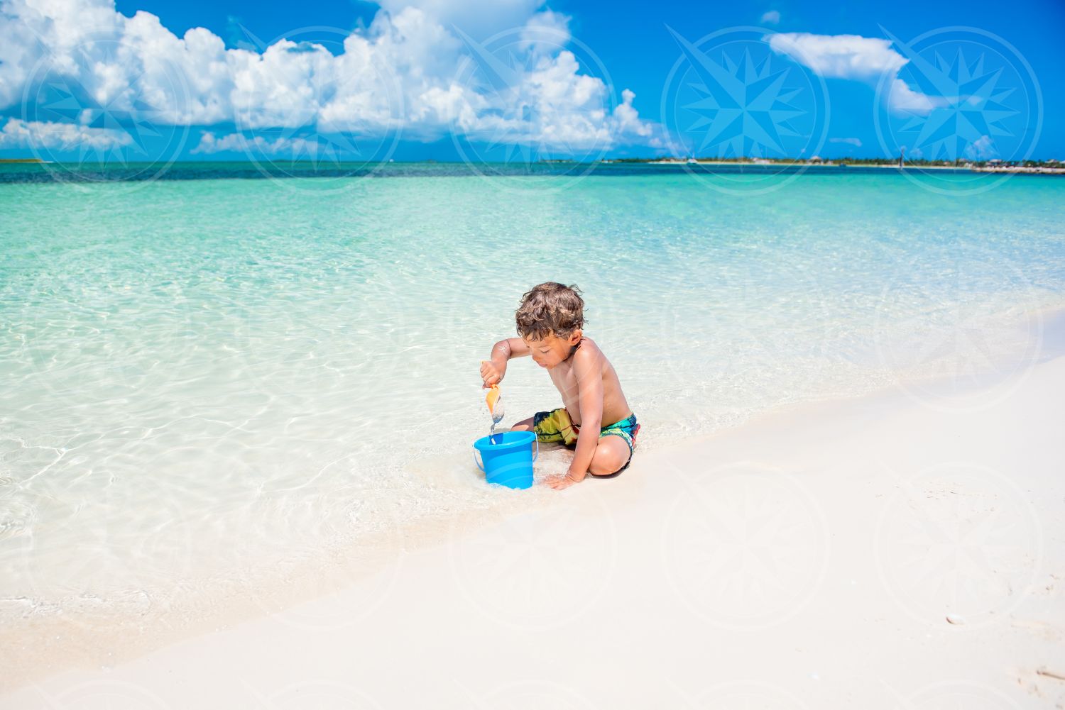 Boy playing in the sand