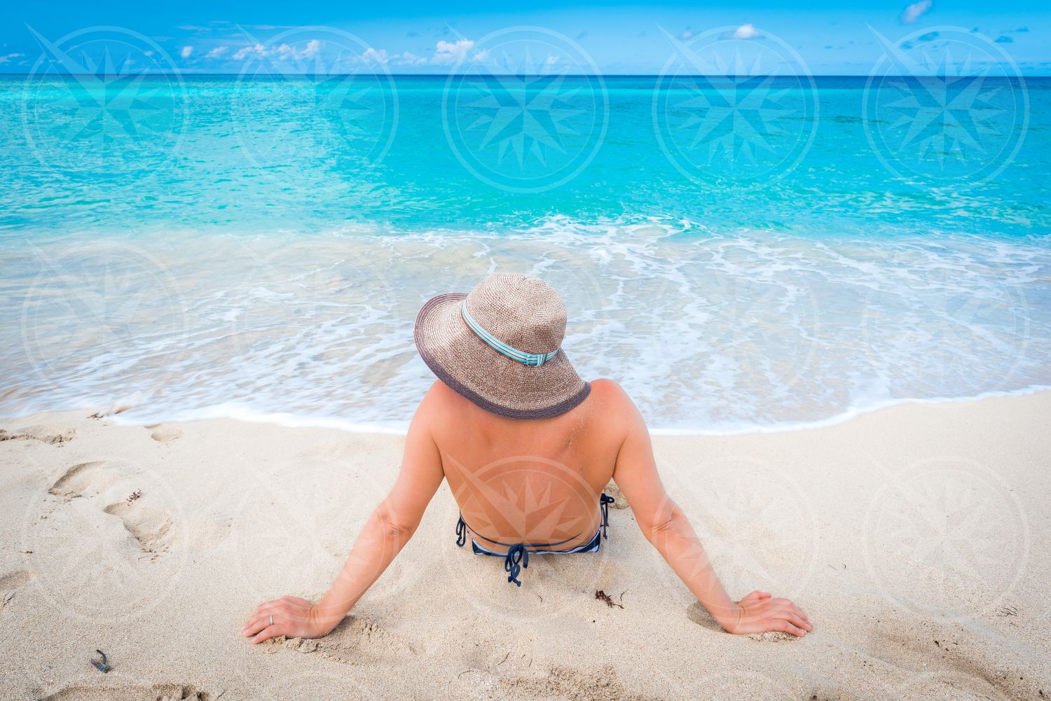 Woman on white sand beach