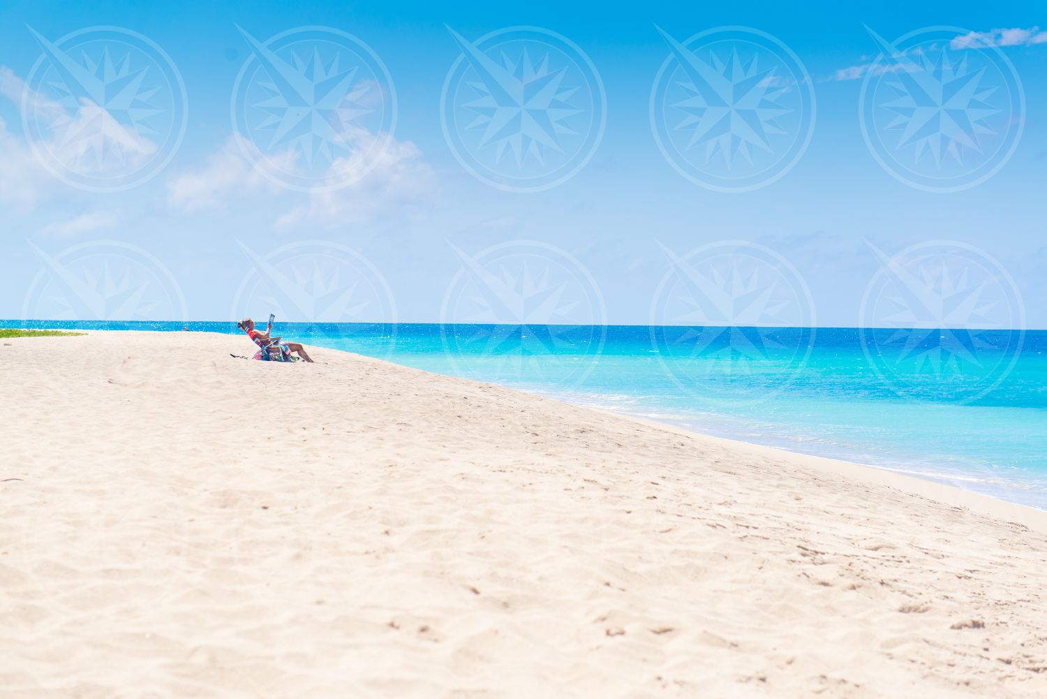 Woman on white sand beach