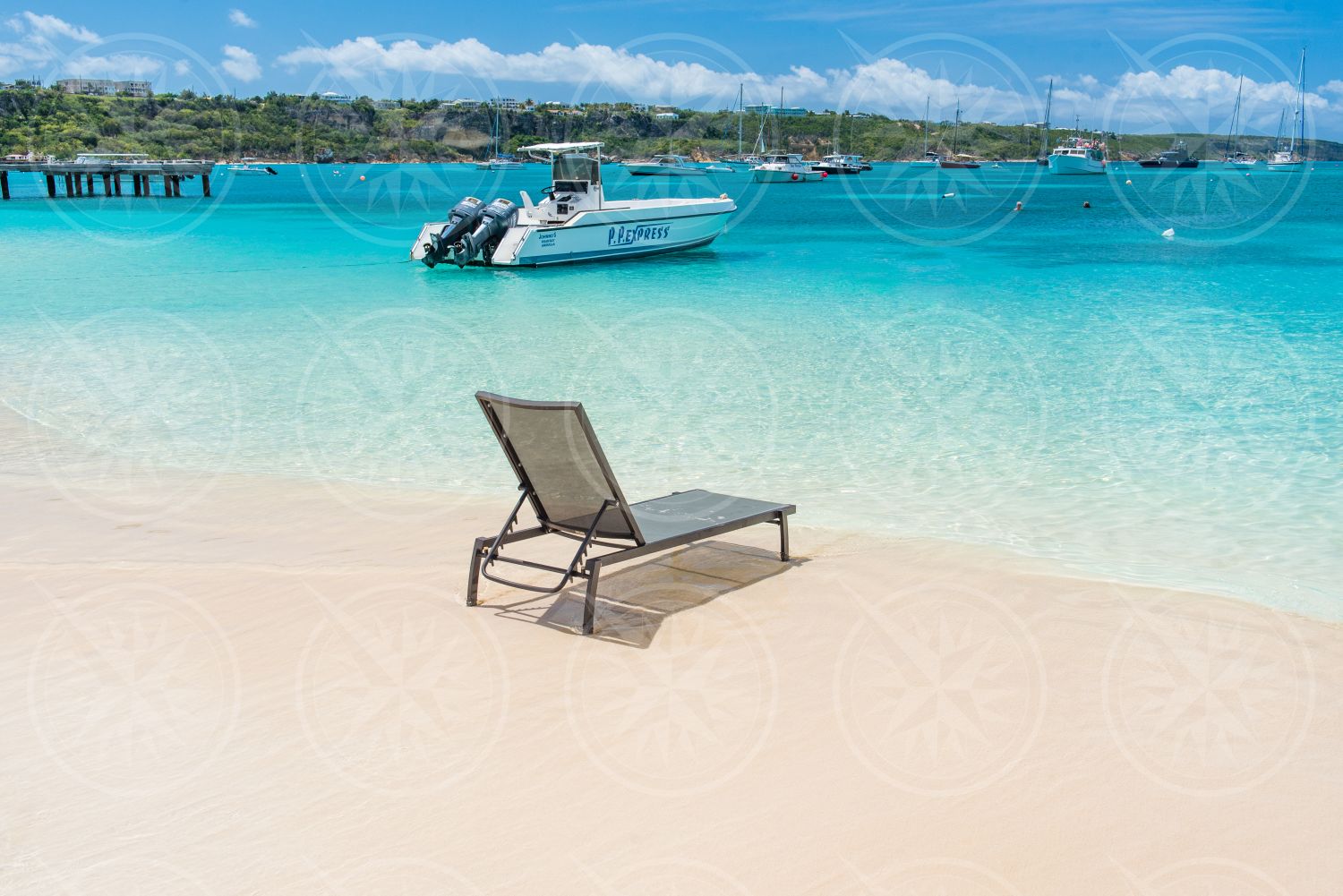 Chair in the water on the beach