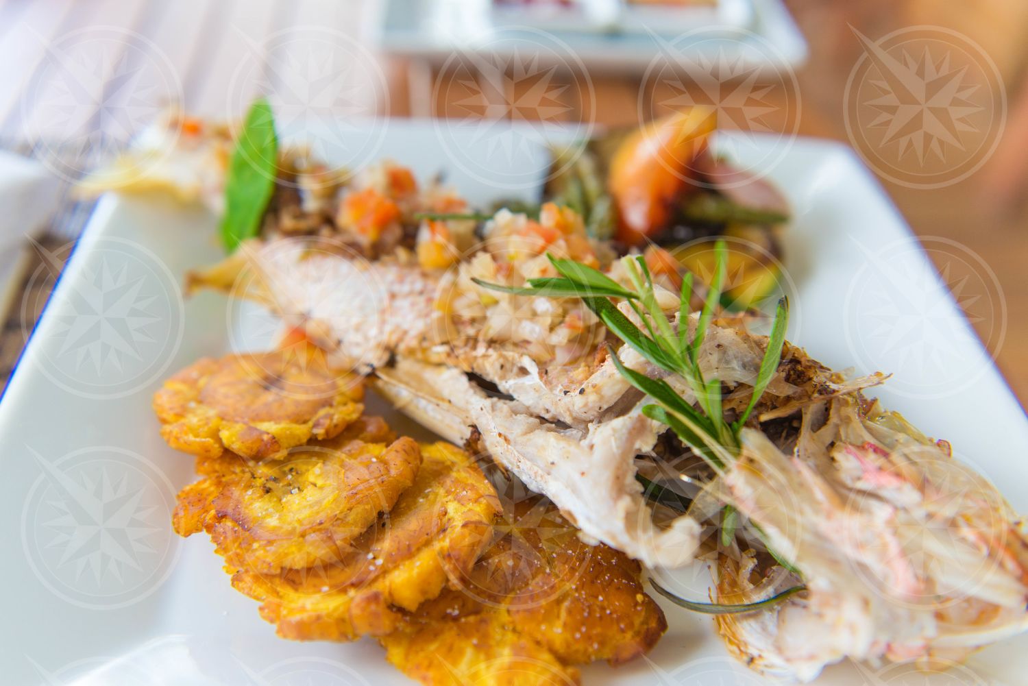 Fried fish with tostones entree