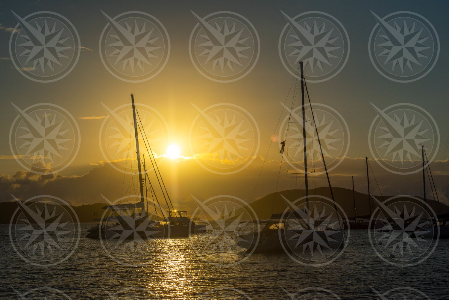 Low sun over boats in anchorage