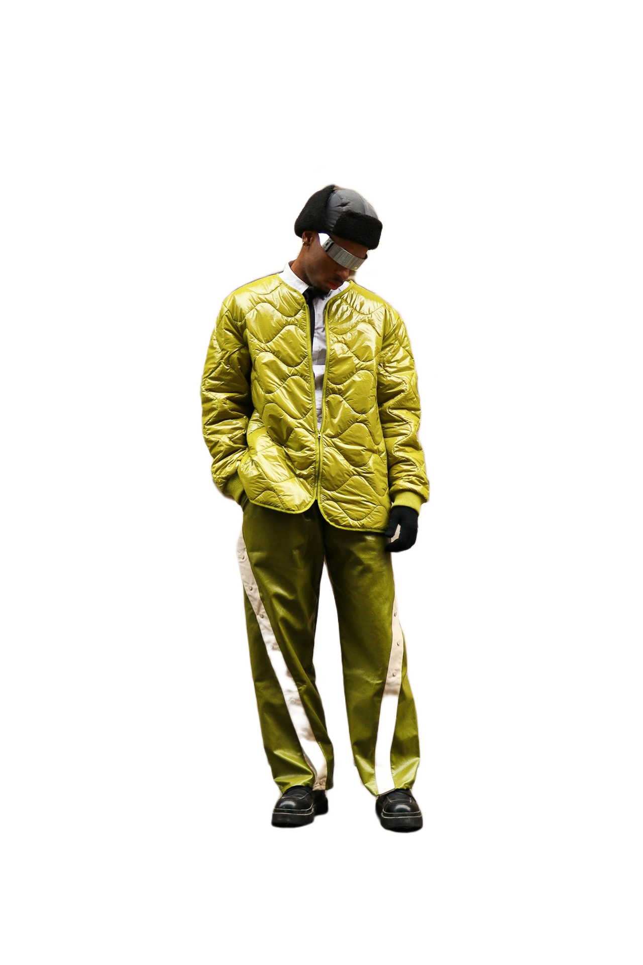 A man in a yellow jacket and green pants