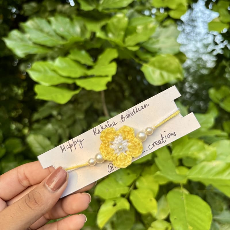 Crochet flower rakhi