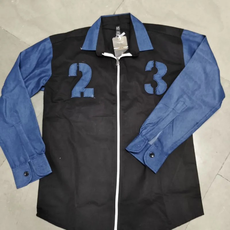 Black shirt and blue sleeves with zipper