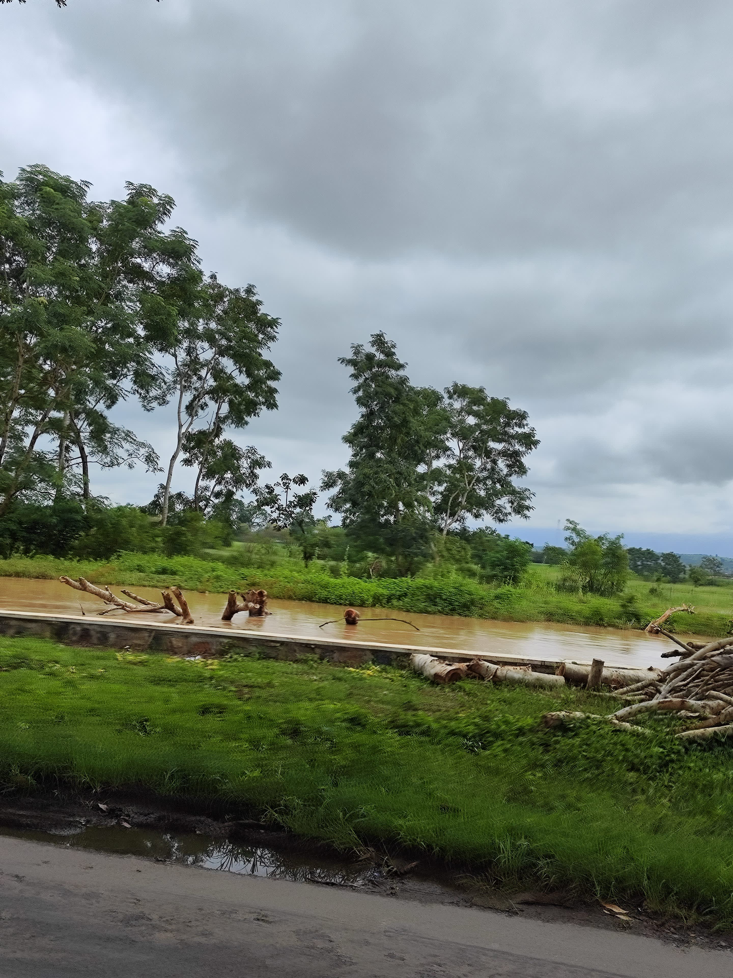 monsoon_clouds_over_the_swollen_river