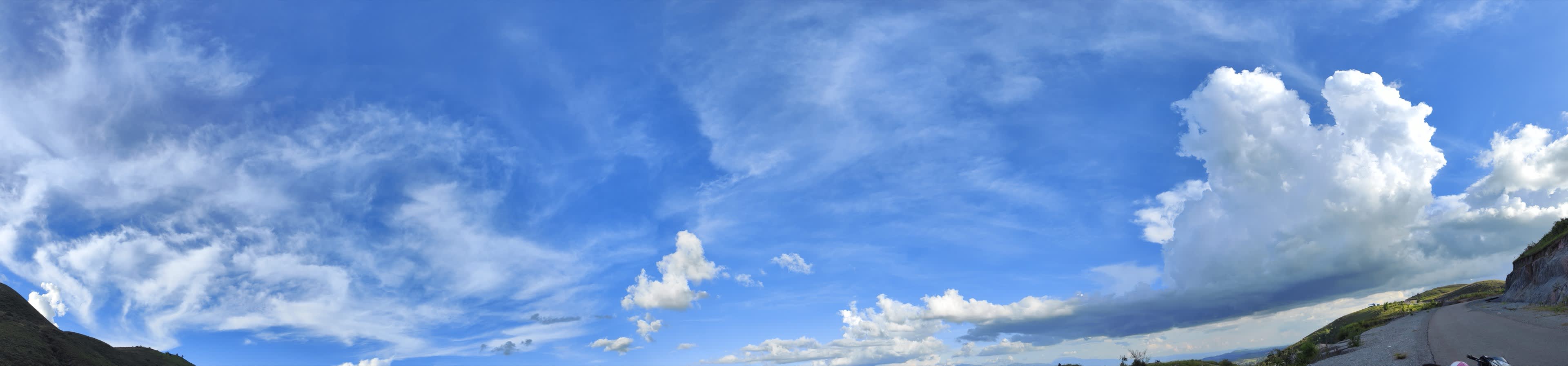 Wide panoramic sky of swirling clouds