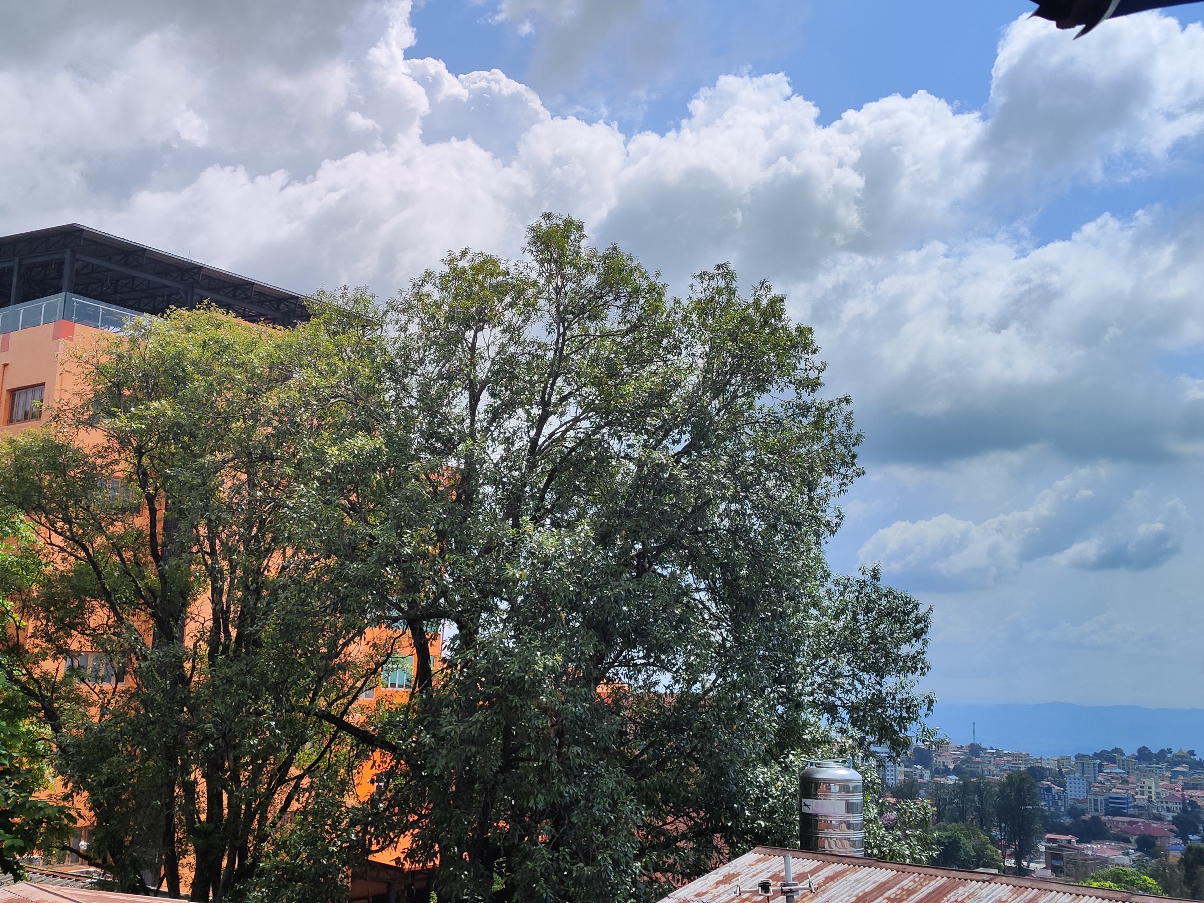 Rooftop view of Taunggyi under cloudy sky