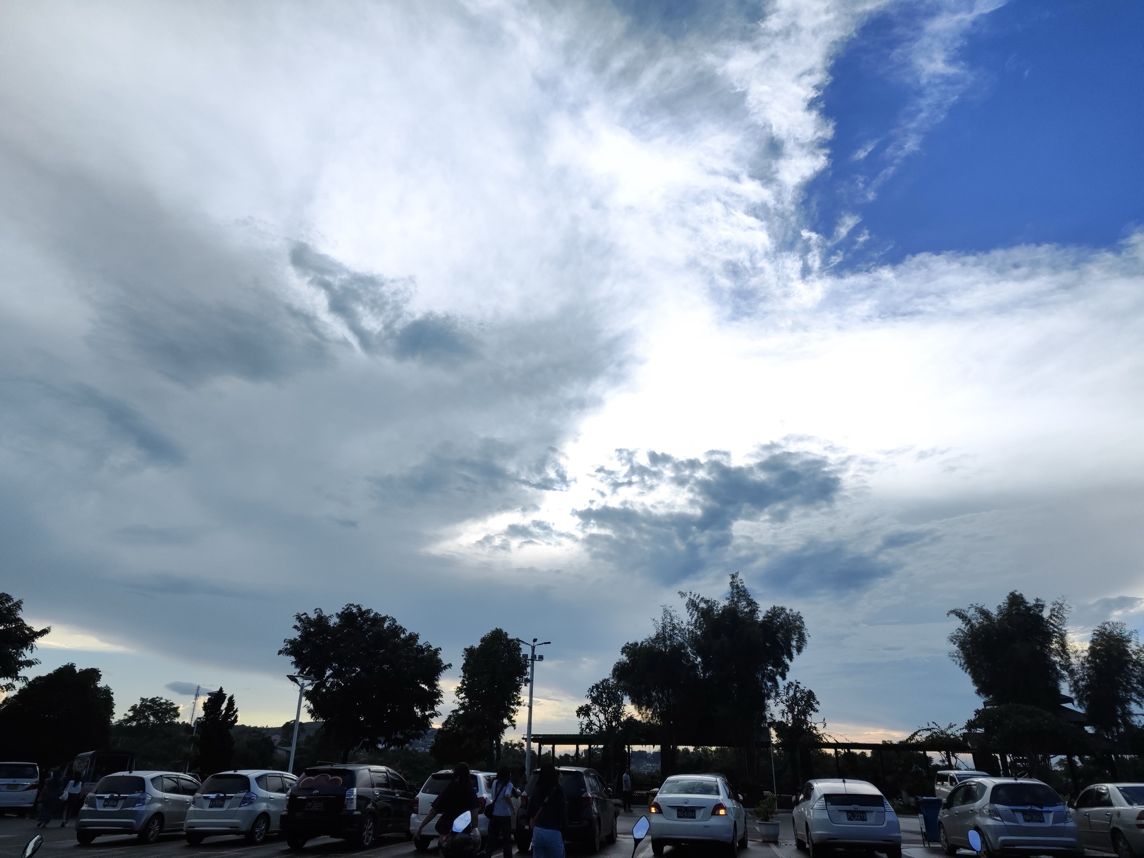 Spreading cloud front in the evening sky