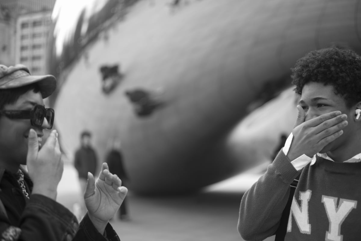 Black and white Chicago street photograph — At The Bean