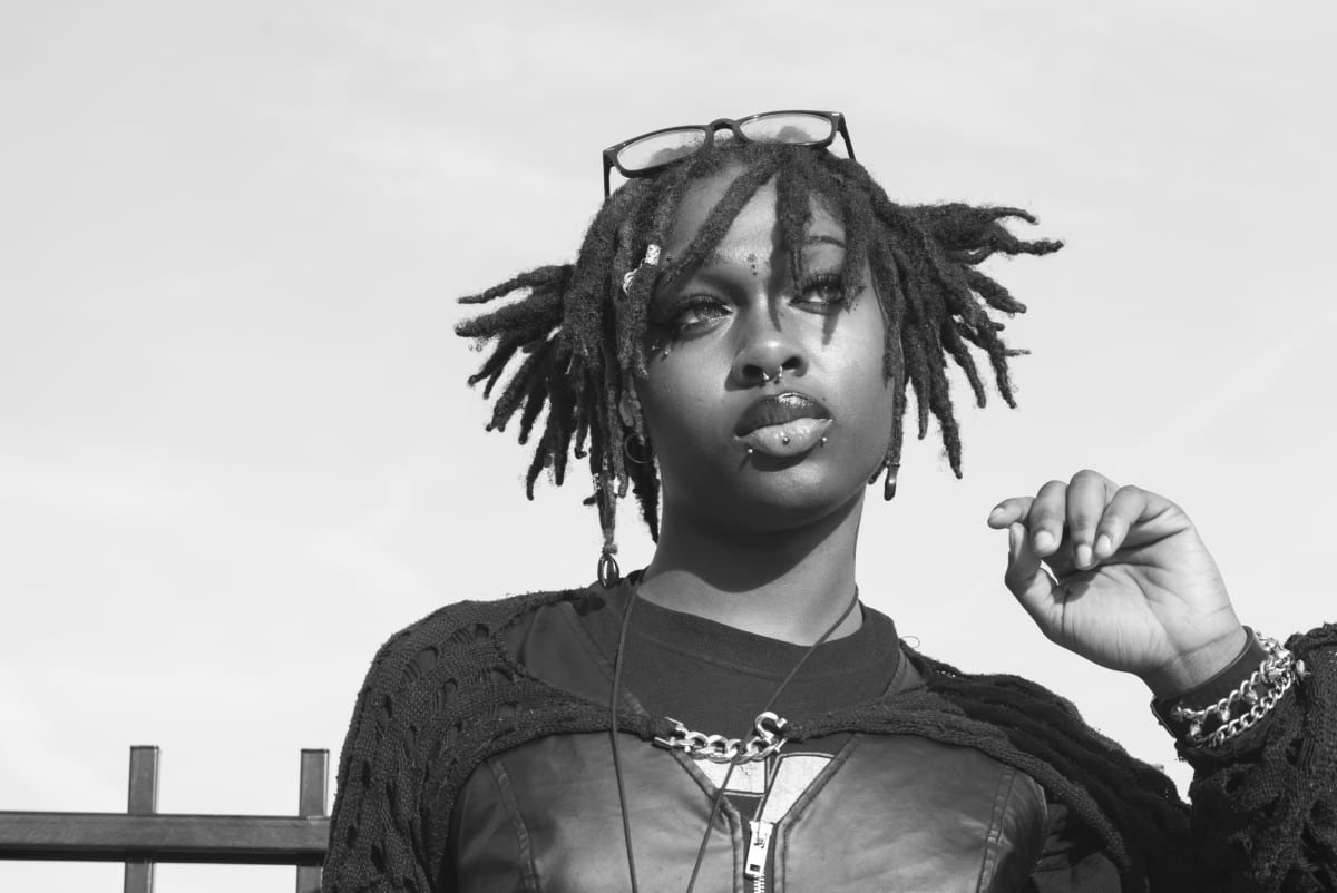 Black and white Chicago street photograph — Voni at Grant Skate Park