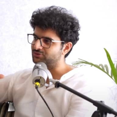 Harkirat Brah meme template: A podcast-style portrait of a young man speaking into a microphone, framed as a conversational reaction image.