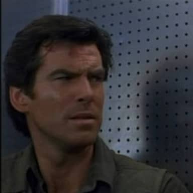 Bothered Bond meme template: Pierce Brosnan as James Bond looking disturbed, brow furrowed, to the side.