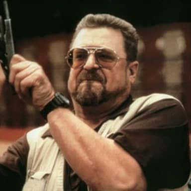 Am I The Only One Around Here meme template: A man in sunglasses, with a goatee, holding a pistol up to his head, looking sternly at the camera.