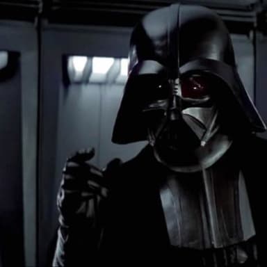 Darth Vader meme template: Darth Vader in his iconic suit, looking intensely at the viewer. He is raising his hand with his fingers spread, as if to emphasize a point or make a statement.