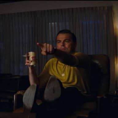 Leonardo DiCaprio Pointing meme template: Leonardo DiCaprio points toward something off screen with delighted recognition, turning a discovery or familiar detail into the visual reaction.