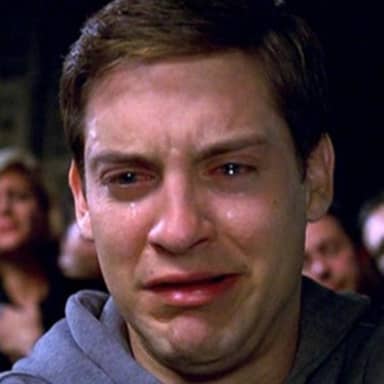 Crying Peter Parker meme template: Close-up of a man's face, eyes streaming with tears, mouth contorted in distress.
