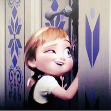 Do You Wanna Build A Snowman meme template: A young girl with blonde hair peeks around a corner, smiling playfully.