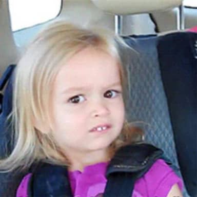 Confused Little Girl meme template: A young girl with blonde hair and a skeptical expression, looking slightly to the side.