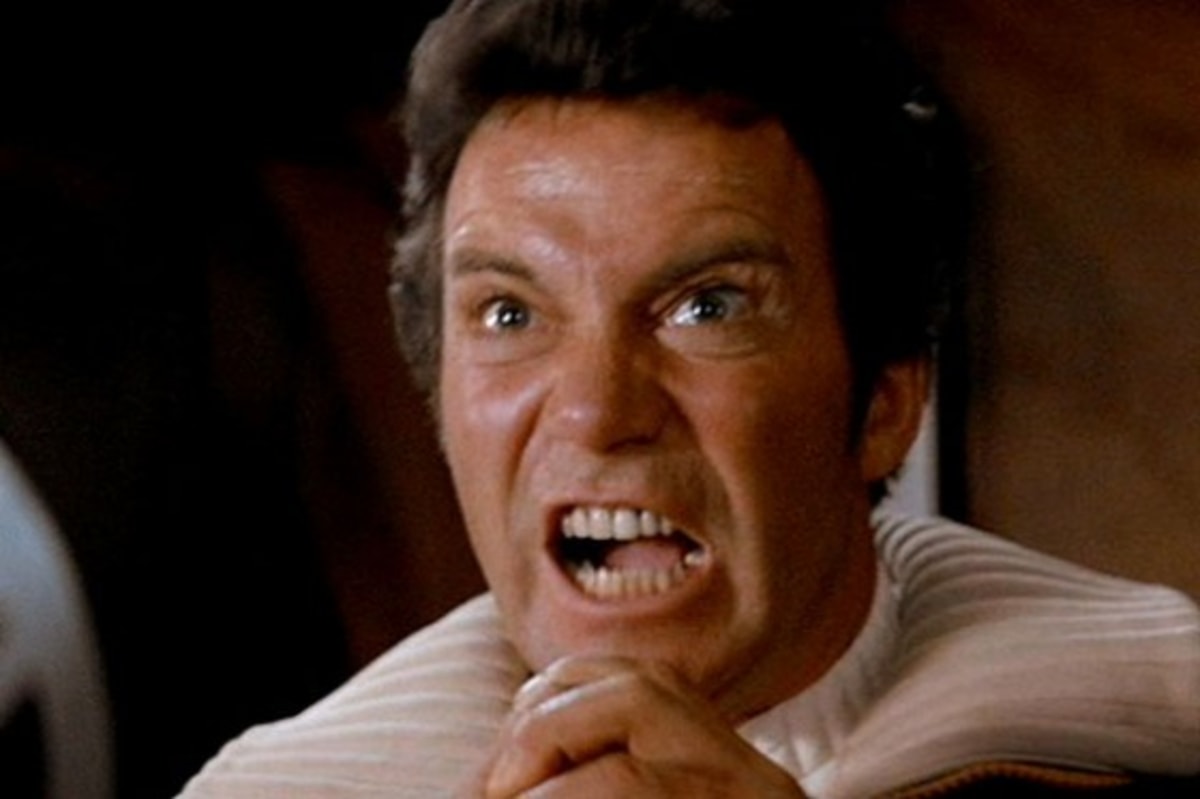 Captain Kirk Khan meme template: Close-up of Captain Kirk from Star Trek II: The Wrath of Khan, screaming with rage and clenched fists.