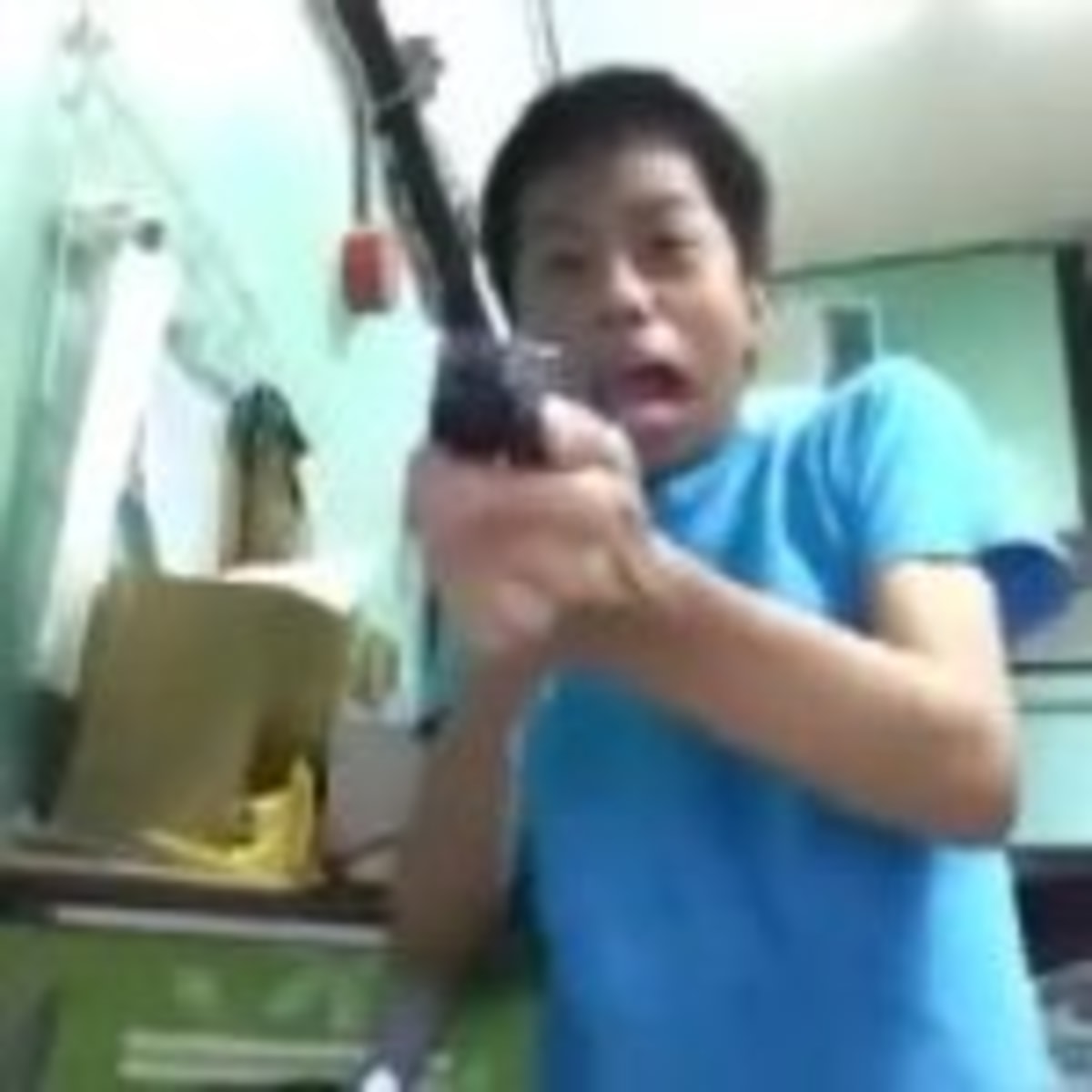 Dude Gets Scared And Shoots The TV Screen meme template: A person recoils in fear while aiming a gun at the camera.