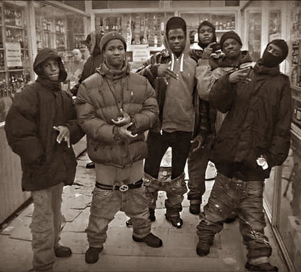 All My Homies Hate meme template: A group of young men are posing for a photo, many with their pants sagging