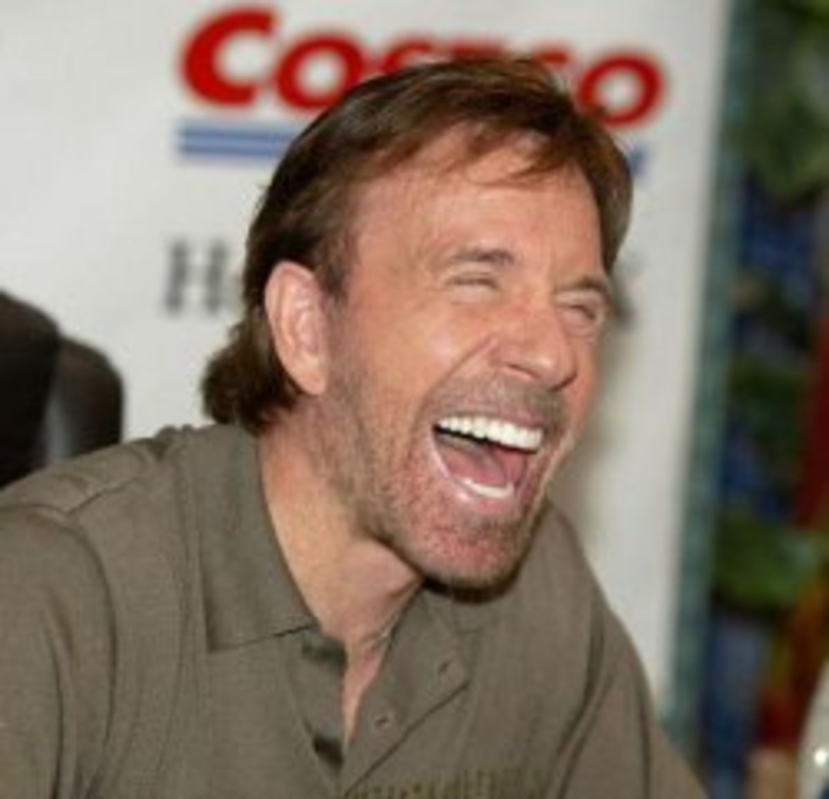 Chuck Norris Laughing meme template: A man (Chuck Norris) is laughing with his mouth wide open and eyes closed.