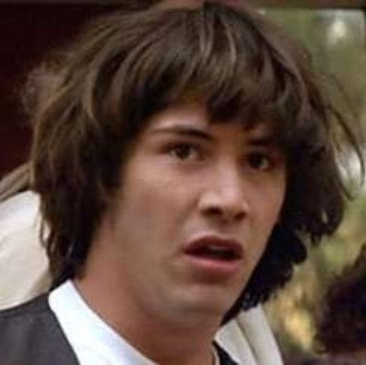 Conspiracy Keanu meme template: A close-up of Keanu Reeves looking shocked or suspicious, with messy hair.